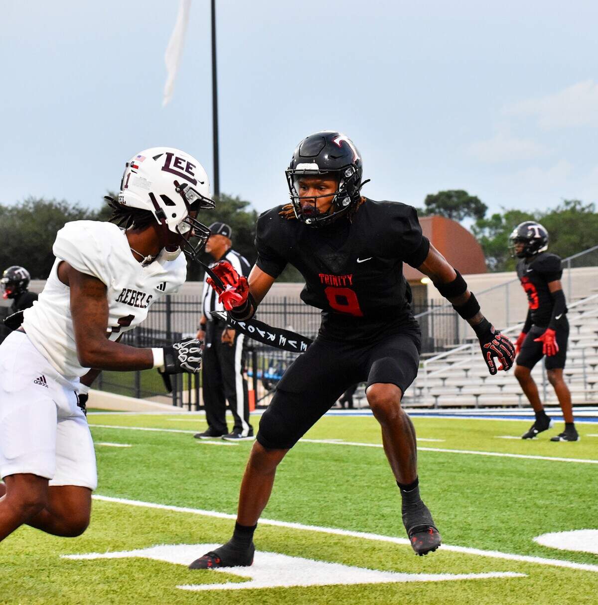 Euless Trinity cornerback John Meredith III (right) is heading straight to college with the Texas Longhorns after his transfer to play at North Crowley for his senior season was denied.